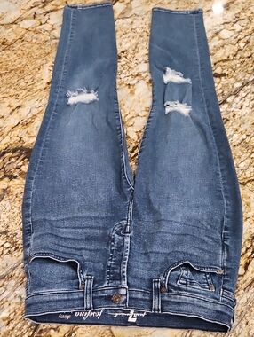 7 for all man kind. Distressed Blue Women’s Jeans. Size 26. Inseam 26" Rise 8"